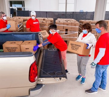 Volunteers loading sweet potatoes in Alabama - 2